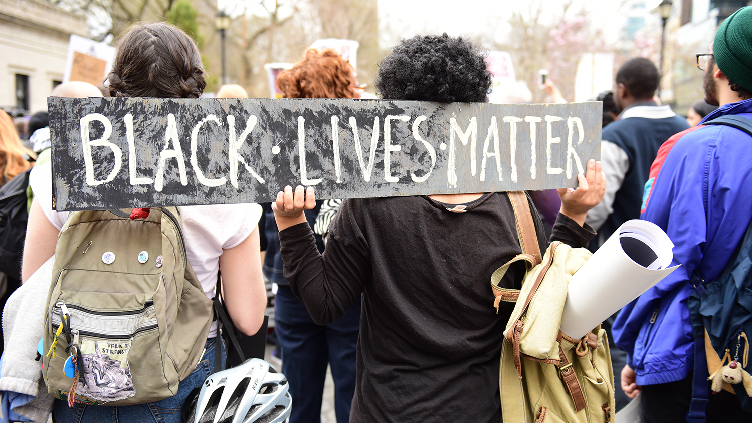 students with a Black Lives Matter sign